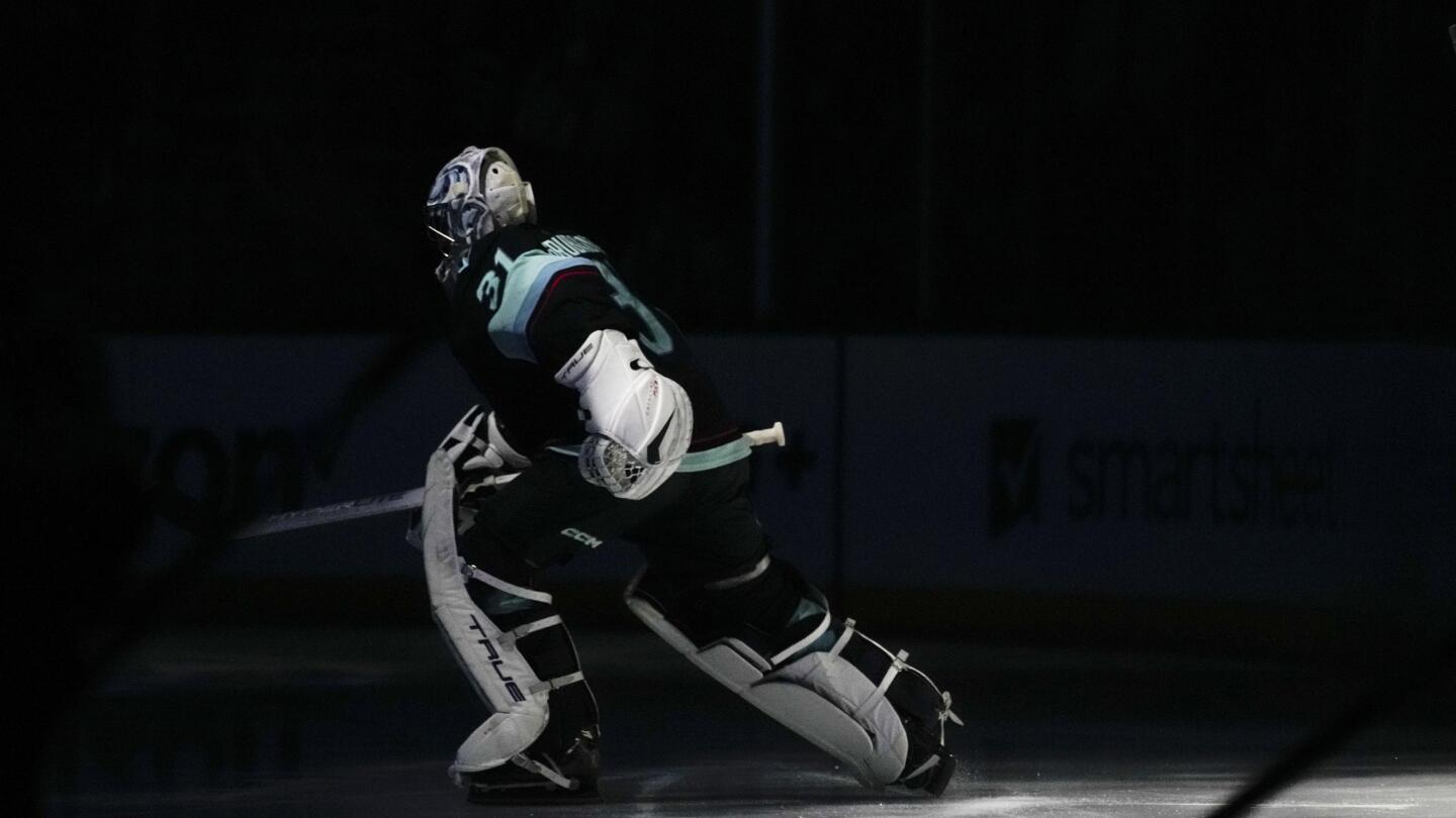 Seattle Kraken goaltender Philipp Grubauer (31) blocks the puck against the  Colorado Avalanche during the third period of Game 4 of an NHL hockey  Stanley Cup first-round playoff series Monday, April 24