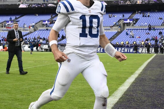 Indianapolis Colts quarterback Gardner Minshew celebrates after the Indianapolis Colts defeated the Baltimore Ravens in overtime of an NFL football game, Sunday, Sept. 24, 2023, in Baltimore. (AP Photo/Nick Wass)
