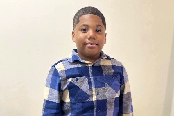 FILE - This December 2022 photo provided by Nakala Murry of Indianola, Miss., shows her 11-year-old son Aderrien Murry, who was shot and wounded by an Indianola Police Department officer on May 20, 2023, during a domestic disturbance call at the home of Murry's family. The Mississippi Attorney General's Office announced Thursday, Dec. 14, that a Mississippi grand jury declined to bring charges against the police officer who responded to a call and shot and wounded the unarmed 11-year-old boy inside the home. (Nakala Murry via AP, File)