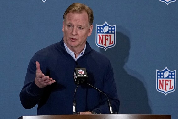 FILE - NFL Commissioner Roger Goodell speaks during a media availability at the NFL football meetings, Tuesday, March 28, 2023, in Phoenix. Jim Trotter, a former NFL Media journalist, is accusing the NFL of refusing to address what he calls longstanding institutional discrimination and said his contract was not renewed because he repeatedly voiced concerns regarding equity and racial injustice. In making his allegations in a discrimination and retaliation lawsuit filed in federal court in New York City on Tuesday, Sept. 12, 2023, Trotter also cited Dallas Cowboys owner Jerry Jones and Buffalo Bills owner Terry Pegula as making racially insensitive comments. Trotter said the concerns he raised with league executives, including NFL Commissioner Roger Goodell, regarding these comments and the lack of diversity among NFL Media employees fell on deaf ears.(AP Photo/Matt York, File)