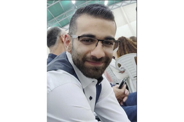 This undated photo provided by Mohammad Darawshe shows Awad Darawshe. When Hamas unleashed its attack on thousands of Jews attending a music festival in southern Israel earlier this month, an Israeli Arab paramedic insisted on staying at the scene to try to save lives. But he sacrificed his own. Awad Darawshe was 23 years old, an Arab Muslim and a citizen of Israel. (Mohammad Darawshe via AP)