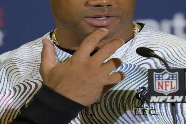 Denver Broncos quarterback Russell Wilson (3) pauses during a press conference after the NFL football game between Denver Broncos and Jacksonville Jaguars at Wembley Stadium London, Sunday, Oct. 30, 2022. Denver Broncos won by 21-17. (AP Photo/Kirsty Wigglesworth)