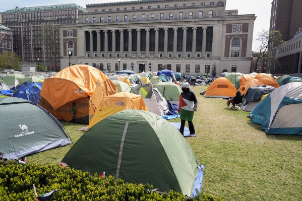 FILE - Student protesters camp on the campus of Columbia University, April 30, 2024, in New York. Columbia has agreed to take additional steps to make its students feel secure on campus under a settlement reached Tuesday, June 4, with a Jewish student who had sought a court order requiring the Ivy League school provide safe access to the campus amid protests over the Israel-Hamas war. (AP Photo/Mary Altaffer, Pool, File)