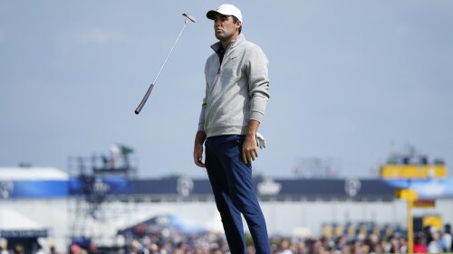 United States' Scottie Scheffler reacts after putting on the 6th green on the first day of the British Open Golf Championships at the Royal Liverpool Golf Club in Hoylake, England, Thursday, July 20, 2023. (AP Photo/=0065cd=)