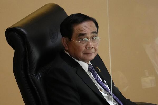 FILE - Thailand Prime Minister Prayuth Chan-ocha attends a no-confidence debate at the Parliament in Bangkok, Thailand, on July 19, 2022. Thailand’s Constitutional Court announced Wednesday, Sept. 14, 2022, that it will issue a ruling on Sept. 30 on whether Prayuth has already served the eight-year legal limit in the position and must step down. (AP Photo/Sakchai Lalit, File)