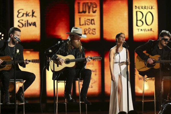 
              The Brothers Osborne, from left, Maren Morris and Eric Church perform at the 60th annual Grammy Awards at Madison Square Garden on Sunday, Jan. 28, 2018, in New York. (Photo by Matt Sayles/Invision/AP)
            