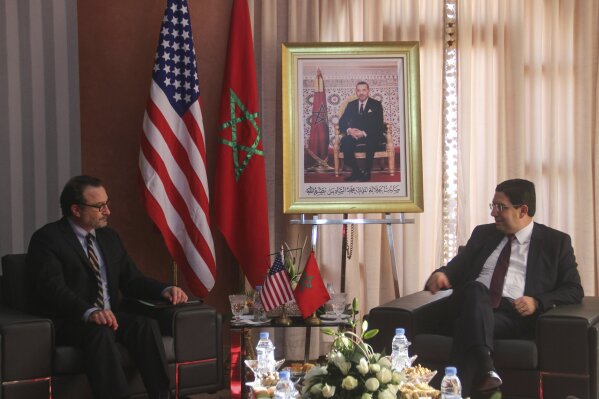 David Schenker, US Assistant Secretary of State for Near Eastern Affairs, left, meets with Nasser Bourita, Moroccan Foreign Minister Nasser Bourita, in Dakhla, Morocco-administered Western Sahara, ...