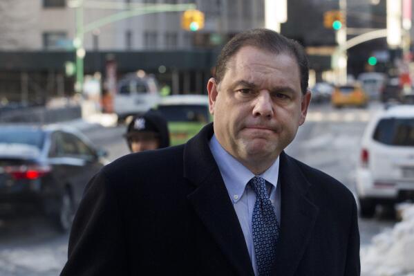 FILE - Joseph Percoco, a former aide to New York Gov. Andrew Cuomo, arrives at federal court for his corruption trial, March 8, 2018, in New York. Percoco was convicted of accepting over $300,000 from companies seeking to influence the Cuomo administration as it worked on the Buffalo Billion project. He was ultimately sentenced to six years in prison, a conviction upheld on appeal. An online database of federal inmates puts his release date from custody in early 2023. (AP Photo/Mark Lennihan, File)