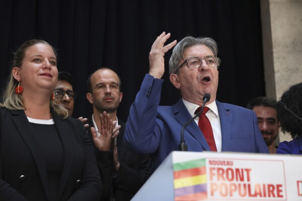 Far-left La France Insoumise - LFI - (France Unbowed) founder Jean-Luc Melenchon delivers a speech on the celebration election evening headquarters, Sunday, July 7, 2024 in Paris. (AP Photo/Thomas Padilla)