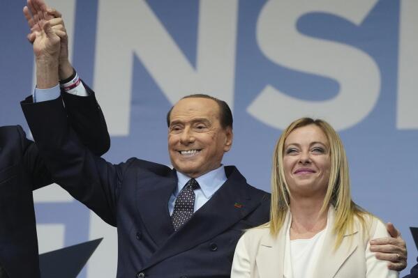 FILE - Forza Italia's Silvio Berlusconi, and Brothers of Italy's Giorgia Meloni attend the center-right coalition closing rally in Rome Thursday, Sept. 22, 2022. The resounding victory by far-right leader Giorgia Meloni in Sept. 25 elections for Parliament isn't sitting well with Silvio Berlusconi, the former three-time conservative premier who, 40 years her senior, fancies himself the elder statesman of Italy's political right. (AP Photo/Gregorio Borgia, File)
