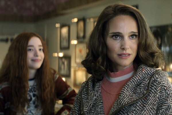This image released by Apple TV+ shows Mikey Madison, left, and Natalie Portman in a scene from "The Lady in the Lake." (Apple TV+ via AP)