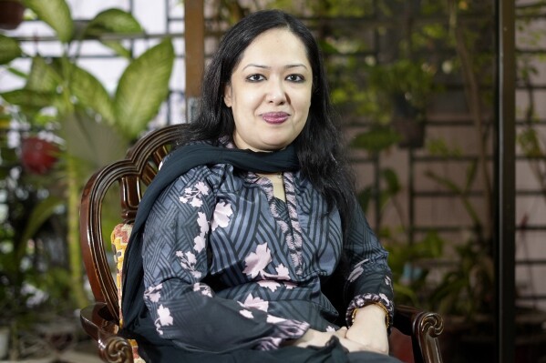 Rumeen Farhana, a politician from the main opposition Bangladesh Nationalist Party (BNP) sits for a photograph during an interview at her residence in Dhaka, Bangladesh, Thursday, Feb. 15, 2024. Farhana, a vocal critic of the ruling party, was falsely depicted wearing a bikini in a video created using artificial intelligence. The viral video sparked outrage in the conservative, majority-Muslim nation. (AP Photo/Al-emrun Garjon)