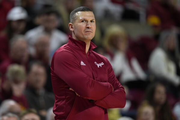 IU Indianapolis head coach Paul Corsaro watches from the bench during the first half of an NCAA college basketball game against Iowa State Monday, Nov. 18, 2024, in Ames, Iowa. (AP Photo/Charlie Neibergall, file)