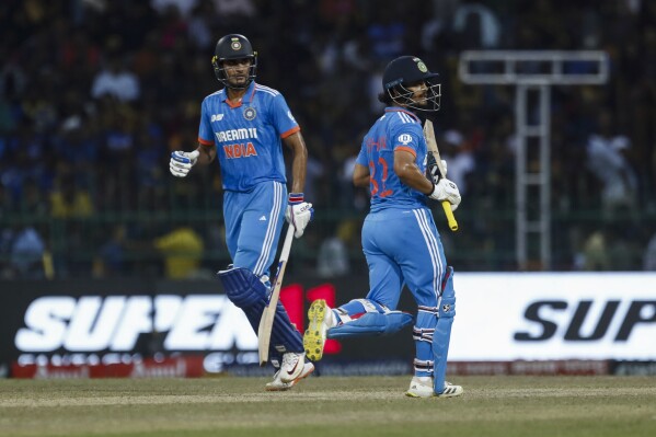 India's Ishan Kishan and India's Shubman Gill run between the wickets during the Asia Cup final cricket match between India and Sri Lanka in Colombo, Sri Lanka, Sunday, Sept. 17, 2023. (AP Photo/Pankaj Nangia)