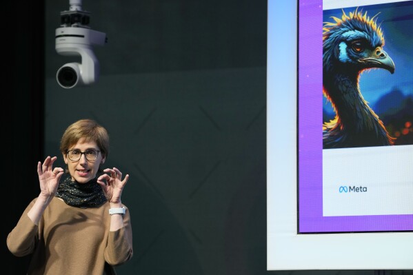 FILE - Joelle Pineau, Vice President AI Research, speaks at the at the Meta AI Day in London on April 9, 2024. Meta, Google and OpenAI, along with leading startups, are churning out new AI language models and trying to persuade customers that they've got the smartest or fastest or cheapest chatbot technology. (Ǻ Photo/Kirsty Wigglesworth, File)