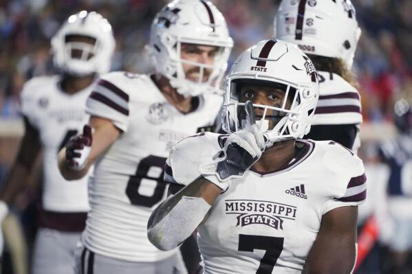 Mississippi State running back Jo'quavious Marks (7) gestures after scoring on a 1-yard touchdown run against Mississippi during the first half of an NCAA college football game in Oxford, Miss., Thursday, Nov. 24, 2022. (AP Photo/Rogelio V. Solis)