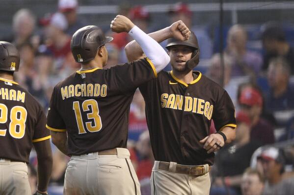 San Diego Padres' Jake Cronenworth, right, celebrates with