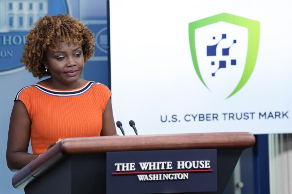 FILE - White House press secretary Karine Jean-Pierre talks about a cybersecurity certification and labeling program at the White House in Washington, July 18, 2023. Smart devices like baby monitors, fitness trackers and internet-connected appliances will soon be eligible for labels certifying that they meet federal cybersecurity standards. Federal officials said Wednesday that the first “Cyber Trust” labels could appear in time for the holiday shopping season. The White House announced the labels last year to help consumers avoid devices that are vulnerable to hacking. (AP Photo/Susan Walsh, File)