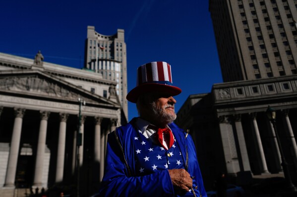 A demonstrator dressed as Uncle Sam attends a protest in Foley Square on the Day of Action for Higher Education, Thursday, April 17, 2025, in New York. (AP Photo/Julia Demaree Nikhinson)