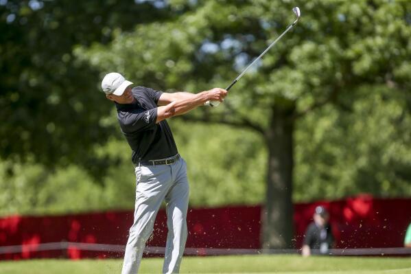 Steve Stricker hits an approach shot on the 15th hole during the third round of the Senior PGA Championship golf tournament at Southern Hills Country Club on Saturday, May 29, 2021, in Tulsa, Okla. (Ian Maule/Tulsa World via AP)