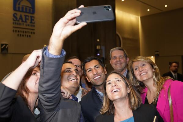 Assemblyman Robert Rivas, D-Hollister, center, takes a selfie with other Assembly Democrats after being elected Speaker-Designee on Thursday, Nov. 10, 2022. (AP Photo/Rich Pedroncelli)