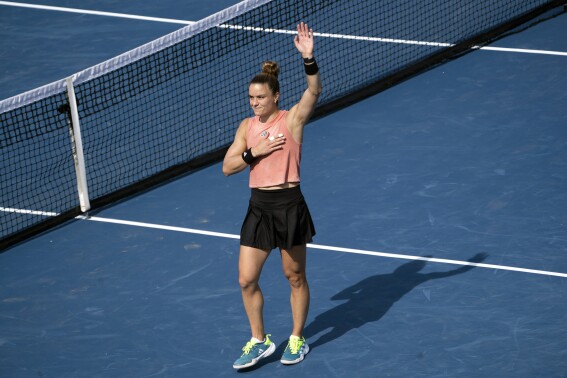 Maria Sakkari, of Greece, gestures to the crowd after defeating Jessica Pegula in the semifinals of the DC Open tennis tournament, Saturday, Aug. 5, 2023 in Washington, D.C. (Minh Connors/The Washington Post via AP)