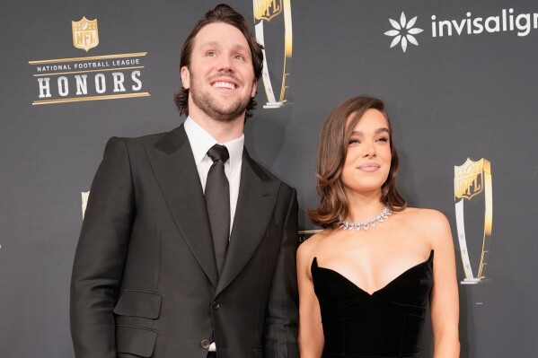 Josh Allen, of the Buffalo Bills, and his fiancé, Hailee Steinfeld, pose on the red carpet at the NFL Honors award show ahead of the Super Bowl 59 football game, Thursday, Feb. 6, 2025, in New Orleans. (AP Photo/Gerald Herbert, File)