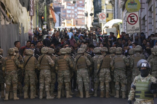 Military police block entry to Plaza Murillo in La Paz, Bolivia, Wednesday, June 26, 2024. (AP Photo/Juan Karita)