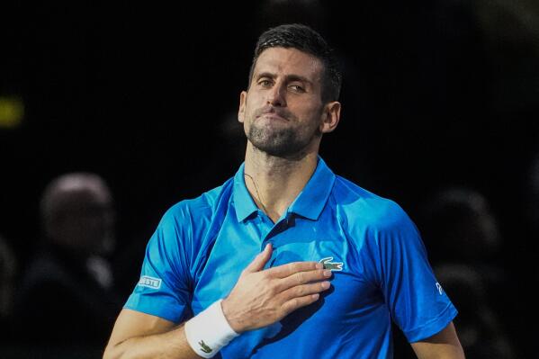 Novak Djokovic of Serbia reacts after defeating Lorenzo Muesetti of Italy during their quarterfinal match of the Paris Masters tennis tournament at the Accor Arena, Friday, Nov. 4, 2022 in Paris. (AP Photo/Michel Euler)