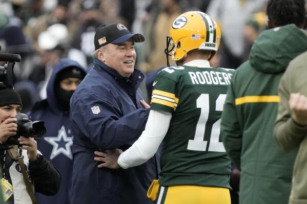 Dallas Cowboys head coach Mike McCarthy, left, and Green Bay Packers quarterback Aaron Rodgers (12) greet each other during warmups before an NFL football game Sunday, Nov. 13, 2022, in Green Bay, Wis. (AP Photo/Morry Gash)