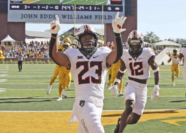 Oklahoma State running back Jaden Nixon celebrates his kickoff return for a touchdown against Baylor in the second half in an NCAA college football game, Saturday, Oct. 1, 2022, in Waco, Texas. Oklahoma State defeated Baylor 36-25. (Rod Aydelotte/Waco Tribune-Herald, via AP)