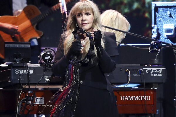 
              Stevie Nicks of the band Fleetwood Mac performs at the 2018 iHeartRadio Music Festival Day 1 held at T-Mobile Arena on Friday, Sept. 21, 2018, in Las Vegas. Nicks will join Def Leppard, Janet Jackson, Radiohead, the Cure, Roxy Music and the Zombies as new members of the Rock and Roll Hall of Fame. The 34th induction ceremony will take place on March 29 at Barclays Center in New York. (Photo by John Salangsang/Invision/AP)
            