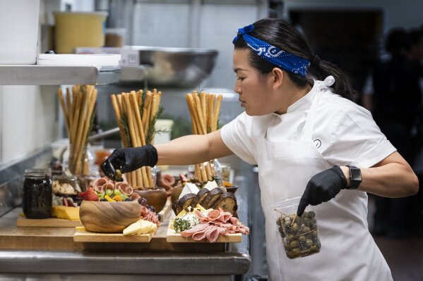 This image released by HBO Max shows Chef Pauline in a scene from the four-part documentary series, “The Event,” which shows the intense planning and details that go into high-profile catering. The series premieres on HBO Max on Jan. 14. (Jessica Brooks/HBO Max via AP)