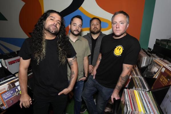 Coheed and Cambria band members, from left, Claudio Sanchez, Zach Cooper, Travis Stever and Josh Eppard pose before performing at Rough Trade NYC on Friday, June 24, 2022 in New York. (Photo by Charles Sykes/Invision/AP)