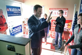 FILE - In this Oct. 20, 2018 file photo, Doug Wardlow, an attorney general candidate greets supporters during a campaign stop in St. Cloud, Minn. Republican Doug Wardlow announced Wednesday, Feb. 17, 2021, he's running again for Minnesota attorney general. Wardlow lost the 2018 race to Democrat Keith Ellison by about 4 percentage points. (Dave Schwarz/The St. Cloud Times via AP File)