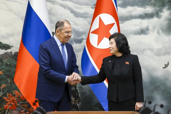 In this photo released by Russian Foreign Ministry Press Service via their telegram channel, Russian Foreign Minister Sergey Lavrov, left, and North Korean Foreign Minister Choe Son Hui shake hands during their meeting in Pyongyang, North Korea, on Thursday, Oct. 19, 2023. (Russian Foreign Ministry Press Service telegram channel via AP)