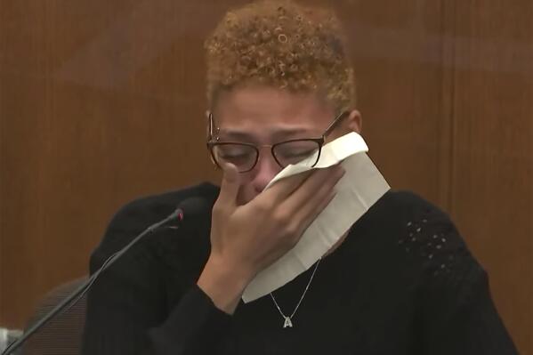 FILE - In this screen grab from video, Alayna Albrecht-Payton, the woman who was in Daunte Wright’s vehicle when he was fatally shot on April 11, 2021, by police in a Minneapolis suburb last year, testifies as Hennepin County Judge Regina Chu presides over court, Dec. 9, 2021, in the trial of former Brooklyn Center Police Officer Kim Potter at the Hennepin County Courthouse in Minneapolis. Albrecht-Payton is suing the city and the former officer, Potter, who killed him. (Court TV, via AP, Pool, File)