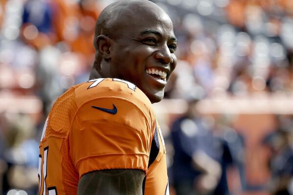 FILE - This Oct. 30, 2016, file photo shows Denver Broncos outside linebacker DeMarcus Ware (94) smiling prior to an NFL football game against the San Diego Chargers in Denver. Ten first-year eligible players, including defensive standout DeMarcus Ware, are among 122 nominees for the 2022 class of the Pro Football Hall of Fame, announced Wednesday, Sept. 22, 2021.(AP Photo/Jack Dempsey, File)