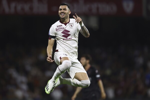 Torino's Nemanja Radonjic celebrates scoring during the Serie A soccer match between Salernitana and Torino, at the Arechi stadium in Salerno, Italy, Monday, Sept. 18, 2023. (Alessandro Garofalo/LaPresse via AP)