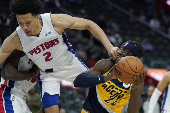 Detroit Pistons guard Cade Cunningham (2) fouls Indiana Pacers guard Caris LeVert (22) during the second half of an NBA basketball game, Wednesday, Nov. 17, 2021, in Detroit. (AP Photo/Carlos Osorio)