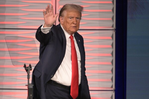 Former President Donald Trump acknowledges attendees after speaking at the Republican Party of Florida Freedom Summit, Saturday, Nov. 4, 2023, in Kissimmee, Fla. (AP Photo/Phelan M. Ebenhack)