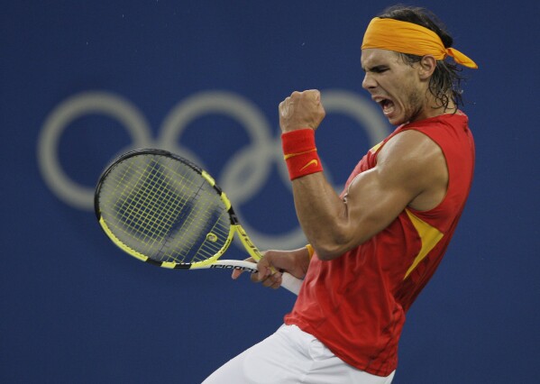 FILE - Rafael Nadal of Spain reacts to winning a point against Fernando Gonzalez of Chile during their Gold medal singles tennis match at the Beijing 2008 Olympics in Beijing, Sunday, Aug. 17, 2008. (AP Photo/Elise Amendola, File)