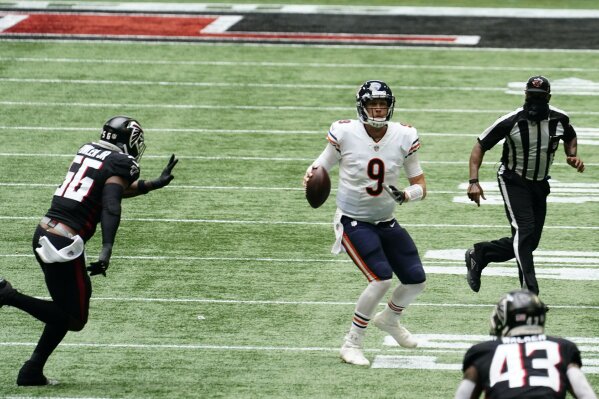 Chicago Bears quarterback Nick Foles (9) works against the Atlanta Falcons during the second half of an NFL football game, Sunday, Sept. 27, 2020, in Atlanta. (AP Photo/Brynn Anderson)