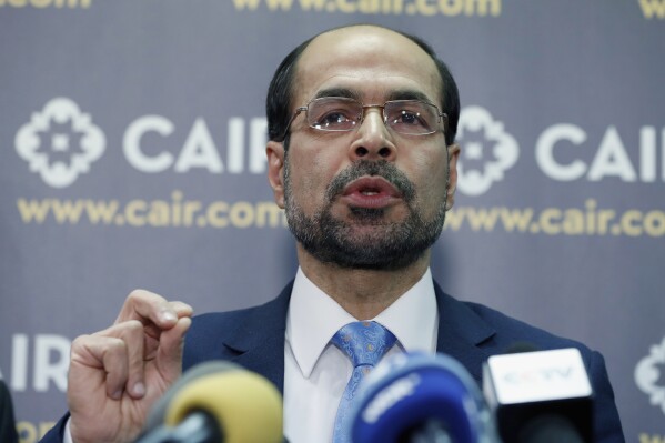 FILE - Council on American-Islamic Relations (CAIR) national executive director Nihad Awad speaks during a news conference, Jan. 30, 2017, in Washington. The national Muslim civil rights group said Thursday, Oct. 19, 2023, that it is moving its annual banquet out of a Virginia hotel that received bomb and death threats possibly linked to the group's concern for Palestinians caught in the Israel-Hamas war. Awad, who is Palestinian American, condemned the threats received by the organization and hotel staff. (AP Photo/Alex Brandon, File)