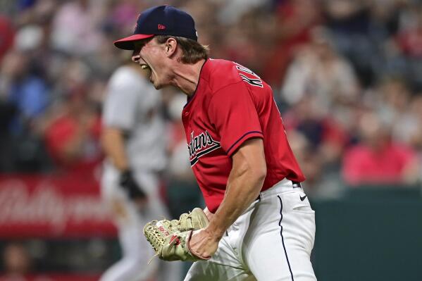 Cleveland Guardians relief pitcher James Karinchak celebrates