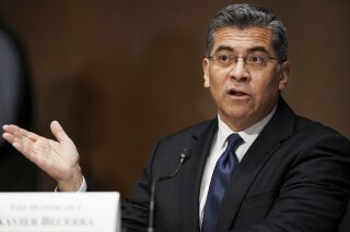 In this feb. 24, 2021, photo, Xavier Becerra testifies during a Senate Finance Committee hearing on his nomination to be secretary of Health and Human Services on Capitol Hill in Washington. President Joe Biden’s pick for health secretary is taking heat for his defense of abortion rights from a tag team of Republicans looking to define him —and the new administration— as out of the mainstream.  (Greg Nash/Pool via AP)