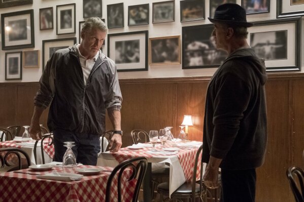 
              This image released by Metro Goldwyn Mayer Pictures / Warner Bros. Pictures shows Dolph Lundgren, left, and Sylvester Stallone in a scene from "Creed II."  (Barry Wetcher/Metro Goldwyn Mayer Pictures/Warner Bros. Pictures via AP)
            