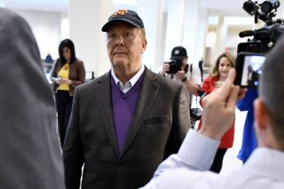 FILE - In this Friday, May 24, 2019, file photo, Mario Batali arrives for arraignment, at municipal court in Boston. Batali, whose career crumbled amid sexual misconduct allegations, no longer owns a stake in Eataly, the Italian marketplaces he once heavily promoted. Chris Giglio, a spokesman for Eataly USA, told The Associated Press on Friday, Aug. 16, the company has purchased Batali’s minority interest, formally ending the relationship. (AP Photo/Josh Reynolds, File)