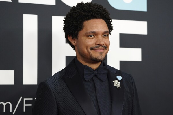 Trevor Noah arrives at the 67th annual Grammy Awards on Sunday, Feb. 2, 2025, in Los Angeles. (Photo by Jordan Strauss/Invision/AP)