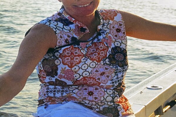 This undated photo provided by John Mackenzie shows Lynn Murray. Murray, 62, was one of multiple people killed in a shooting at a supermarket in Boulder, Colo. A picture of the victims of the shooting on Monday, March 22, 2021, began to emerge as the suspect in the killings remained hospitalized Tuesday but was expected to be booked into jail on murder charges. (John Mackenzie via AP)